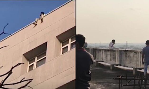 बिल्डिंग से पांव लटकाए कूदने को तैयार…फोन पर रोती हुई लड़की …ऐसे बची जान, VIDEO